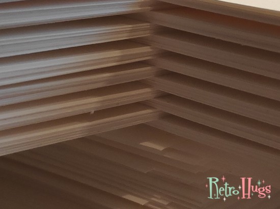 Planner inserts 2023; 14 stacks of 10 sheets of 160 grams creamy white paper, waiting to be printed.